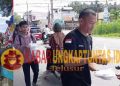 100 Paket Makanan Siap Saji untuk Publik: Aksi Kemanusiaan Haji Suci di Simpang Marisa dalam Spirit Jumat Berkah