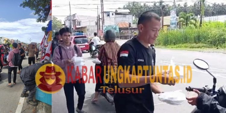 100 Paket Makanan Siap Saji untuk Publik: Aksi Kemanusiaan Haji Suci di Simpang Marisa dalam Spirit Jumat Berkah